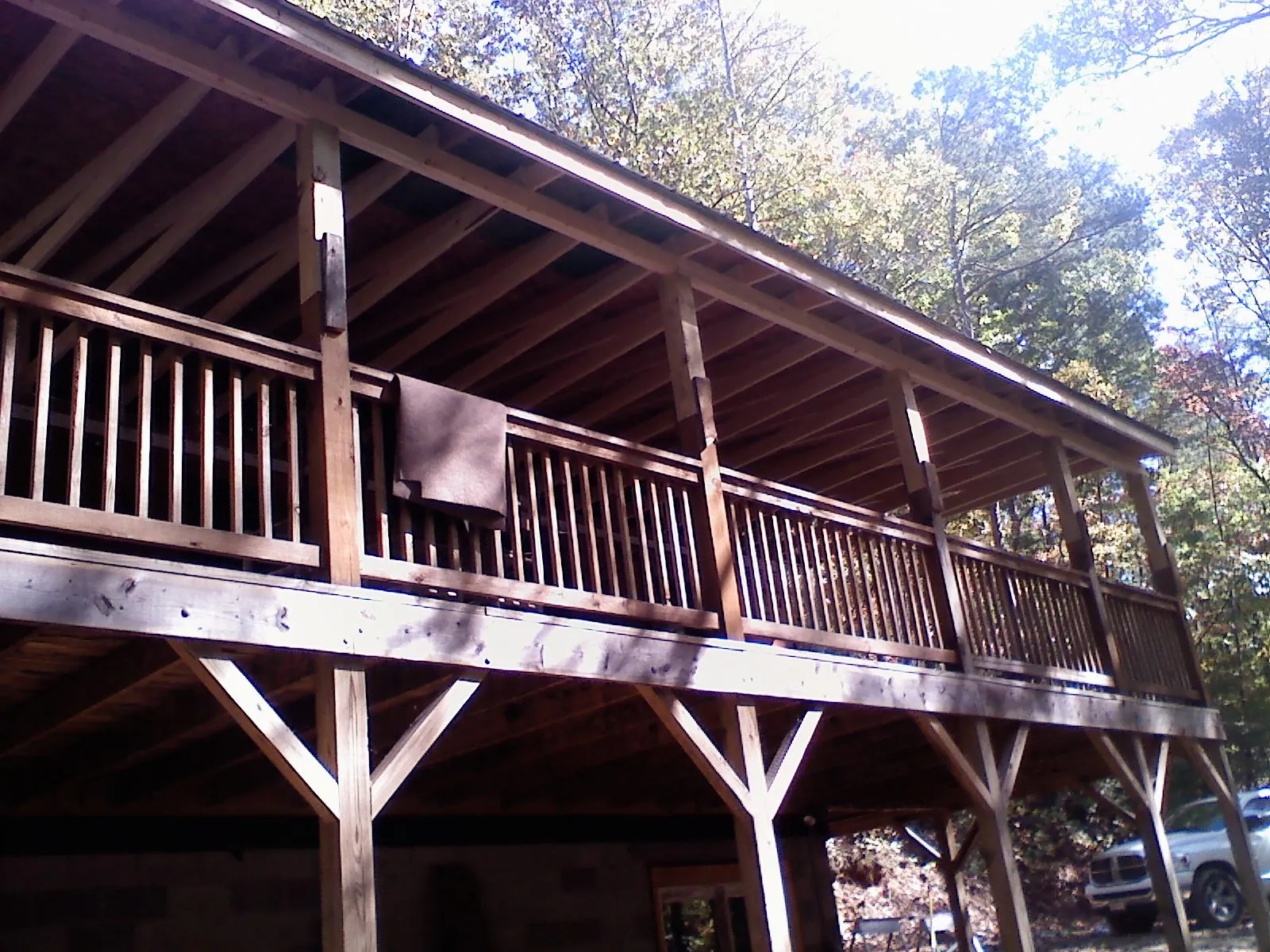 Timber framing under a new elevated porch and deck — Roof Leak Repair in Chepachet by Roofing Brothers
